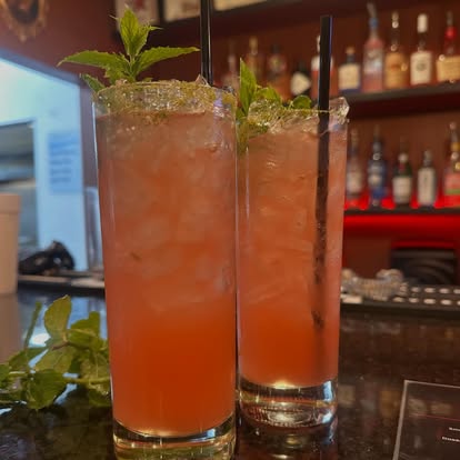 Two fresh cocktails with mint at the Fuego bar
